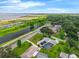 Aerial view of neighborhood homes near the lake and lush vegetation at 101 Lakeshore Blvd, St Cloud, FL 34769