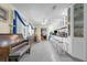 Open kitchen with island seating and piano nearby at 101 Lakeshore Blvd, St Cloud, FL 34769