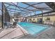 Relaxing screened pool and lanai with seating areas, ideal for outdoor entertaining at 101 Lakeshore Blvd, St Cloud, FL 34769