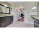 Bathroom with a granite countertop vanity that flows to the hallway and bedroom at 107 Wekiva Pointe Cir, Apopka, FL 32712