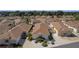 Aerial view of neighborhood homes with mature trees and manicured landscaping at 1116 San Bernardo Rd, The Villages, FL 32162