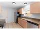 Bright kitchen features stainless steel appliances and granite countertops at 1116 San Bernardo Rd, The Villages, FL 32162