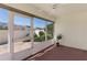 Enclosed sunroom with tile flooring and views of a garden and patio at 1116 San Bernardo Rd, The Villages, FL 32162