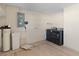 Laundry room with full size washer and dryer at 1116 San Bernardo Rd, The Villages, FL 32162