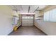 An empty garage with shelves and a window at 11418 Lake Eustis Dr, Leesburg, FL 34788
