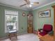 Serene bedroom space with ample light, storage and decor at 12288 Sw 35Th Dr, Webster, FL 33597