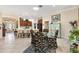 Open floor plan from living room to kitchen and dining, with a grand entrance at 1376 Birdsong Pl, The Villages, FL 32163