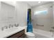 Bright bathroom with white counter tops and a shower/tub combo at 1449 Jeremy Cir, The Villages, FL 34762