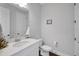 Bathroom with white cabinetry, a stylish faucet, and a sailboat decoration next to the vanity at 14501 Wabasso Loop, Winter Garden, FL 34787