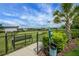 Enjoy the spacious, fenced dog park with benches and pet waste station on a beautiful, sunny day at 14501 Wabasso Loop, Winter Garden, FL 34787