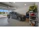 Spacious garage featuring an EV Charger and plenty of storage at 14501 Wabasso Loop, Winter Garden, FL 34787
