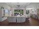 Bright living room with pool view, comfortable seating, and seamless indoor-outdoor flow at 14501 Wabasso Loop, Winter Garden, FL 34787