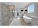 Spa-like main bathroom with soaking tub, walk-in shower, and bright natural light at 14501 Wabasso Loop, Winter Garden, FL 34787