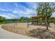 Enjoy the community playground with swings, climbing bars and gazebo on a beautiful sunny day at 14501 Wabasso Loop, Winter Garden, FL 34787