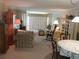 Cozy living room with comfortable seating and plenty of natural light at 146 Hibiscus Way, Leesburg, FL 34748