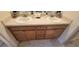 Bathroom vanity with and sink and white countertop at 1550 Ward Ct, The Villages, FL 32162
