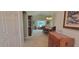 Inviting dining room featuring classic furnishings, a chandelier, and abundant natural light at 1550 Ward Ct, The Villages, FL 32162