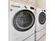 Modern laundry room featuring new LG washer and dryer with large capacity at 15531 Waterleigh Cove Dr, Winter Garden, FL 34787