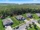 Aerial of property with red outline showing proximity to the lake and surrounding nature at 1640 Marsh Pointe Dr, Clermont, FL 34711
