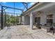 Covered patio with pavers, outdoor seating, ceiling fan, and access to backyard at 1640 Marsh Pointe Dr, Clermont, FL 34711