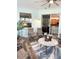 Comfortable sunroom with multiple windows offering lots of natural light and backyard views at 1676 Van Buren Way, The Villages, FL 32162