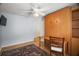 Bedroom with ceiling fan, built in cabinet and Murphy bed with light blue walls at 16827 Se 92Nd Lance Ct, The Villages, FL 32162