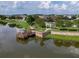Aerial view of community park with pond, dock and gazebo at 1861 Remembrance Ave, St Cloud, FL 34769