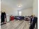 Bedroom showcasing modern flooring with ample space and a window view at 1861 Remembrance Ave, St Cloud, FL 34769