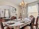 Well-appointed dining room showcasing open flow to living areas and stylish décor at 1861 Remembrance Ave, St Cloud, FL 34769