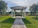 Gazebo with bench overlooking the water at 1861 Remembrance Ave, St Cloud, FL 34769