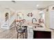 Kitchen island with seating, granite countertop, and stainless steel sink at 1861 Remembrance Ave, St Cloud, FL 34769