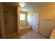 Bathroom view with tub and shower featuring tiled floors and neutral walls at 2007 Country Brook Ave, Clermont, FL 34711