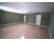 Bright and spacious bedroom with laminate flooring and fresh, neutral paint at 2007 Country Brook Ave, Clermont, FL 34711