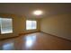 Bright bedroom with wood floors, neutral walls, and lots of natural light at 2007 Country Brook Ave, Clermont, FL 34711
