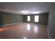Large bedroom featuring light wood floors, neutral walls, and great natural light at 2007 Country Brook Ave, Clermont, FL 34711