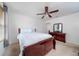 Comfortable bedroom with ceiling fan, good natural light, closet, and calming color scheme at 212 Primrose Dr, Davenport, FL 33837