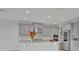 Well-lit kitchen with modern appliances and grey cabinets at 2147 Timber Creek Ln, Clermont, FL 34715