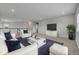 Bright, open living room with modern decor and comfortable seating arrangement at 2147 Timber Creek Ln, Clermont, FL 34715