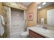 Bathroom includes a tub/shower combo and neutral accents at 215 Chula Vista Ave, The Villages, FL 32159