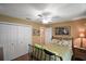 Cozy bedroom with ceiling fan, double closets, and natural light at 215 Chula Vista Ave, The Villages, FL 32159