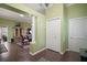 Bright foyer with decorative columns leading to living spaces at 215 Chula Vista Ave, The Villages, FL 32159