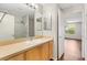 Bathroom with shower and vanity at 2317 Whisper St, The Villages, FL 32162