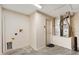 Garage featuring essential utilities like a water heater and some storage space at 2317 Whisper St, The Villages, FL 32162