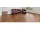 Cozy living room featuring hardwood floors and ample space at 2317 Whisper St, The Villages, FL 32162