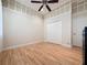 Bedroom with wood floors, and a ceiling fan at 243 Bayou Bend Rd, Groveland, FL 34736