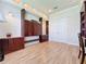Bright room with beautiful hardwood flooring and extensive built-in cabinetry and storage at 243 Bayou Bend Rd, Groveland, FL 34736