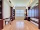 Bright room with wooden built-in desks and cabinets and a window with natural light at 243 Bayou Bend Rd, Groveland, FL 34736
