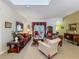 Elegant living room with tile floors, comfortable seating, and stylish decor at 25222 Laurel Valley Rd, Leesburg, FL 34748