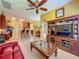 Spacious living room with open layout, connecting to the kitchen and dining area at 25222 Laurel Valley Rd, Leesburg, FL 34748