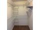 Walk-in closet with multiple wire shelving units at 2530 Hanlon Ter, The Villages, FL 32162